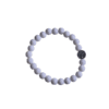 Kralenarmband met witte acrylkralen en een zilveren of goudkleurige levensboom bedel